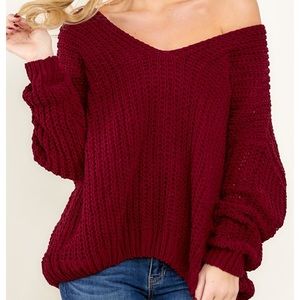 Red one shoulder oversized knit sweater